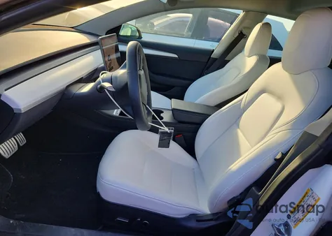 2022 Tesla Model 3 z USA, uszkodzony, nr VIN 5YJ3E1EC5NF297234